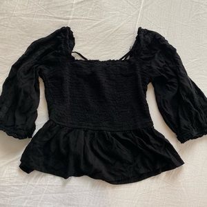 Black ruffled shirt